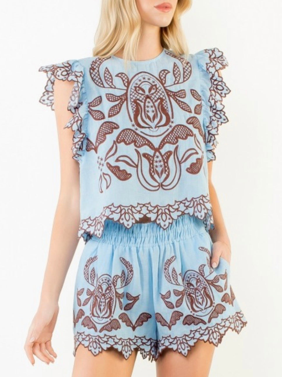 Light blue and burgundy lace fabric top