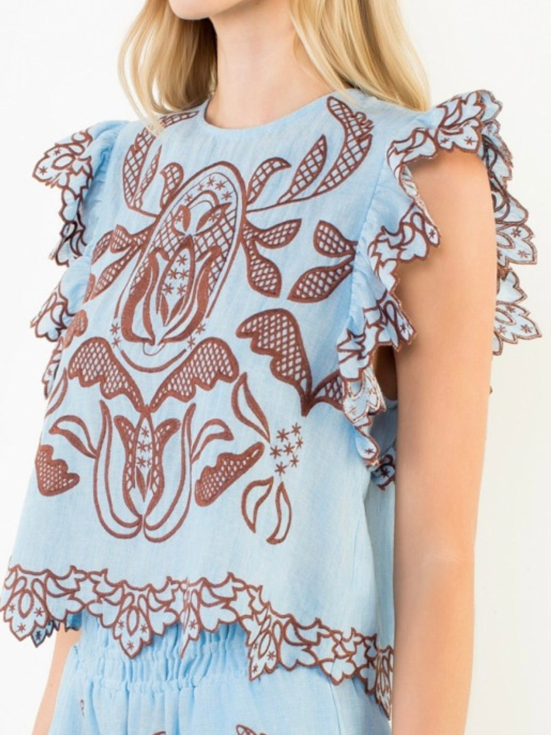 Light blue and burgundy lace fabric top