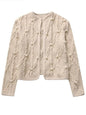 Beige knitted pearls with texture sweater