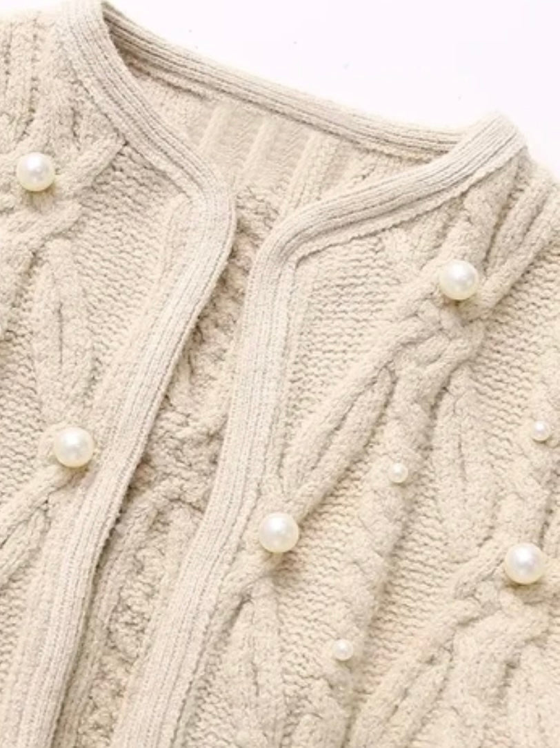 Beige knitted pearls with texture sweater