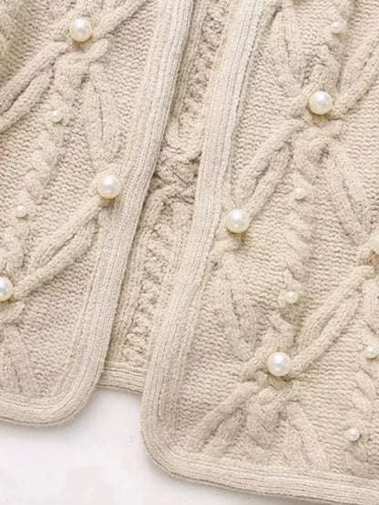 Beige knitted pearls with texture sweater