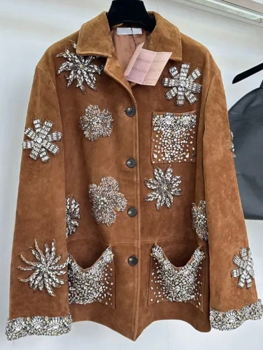 Brown leather jacket with floral details