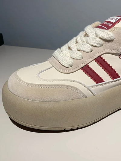 Beige and burgundy platform lace up sneakers