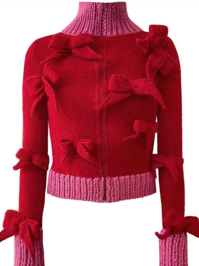 Red and fuchsia turtleneck bows sweater