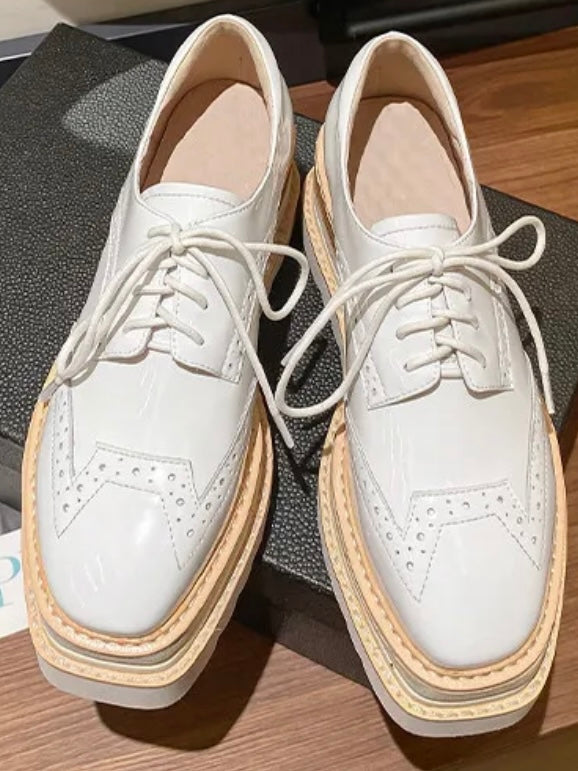 Lace up solid colors oxfords