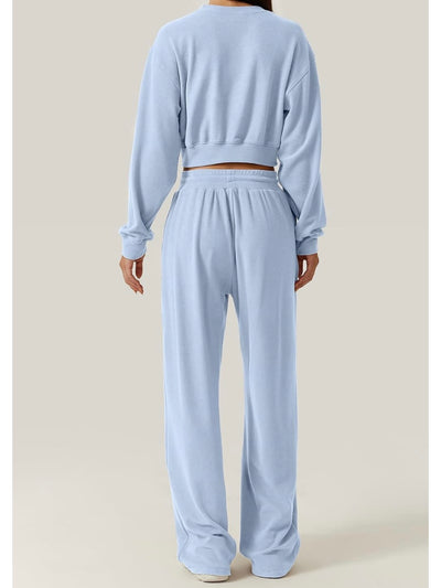 Light blue set of 2. Crossed sweater and joggers pants