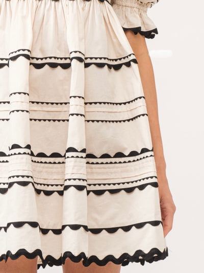 White and black embroidered mini dress