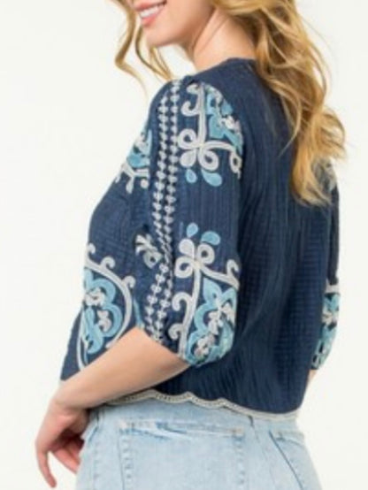 Blue embroidered floral texture top