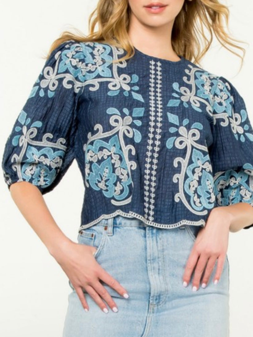 Blue embroidered floral texture top