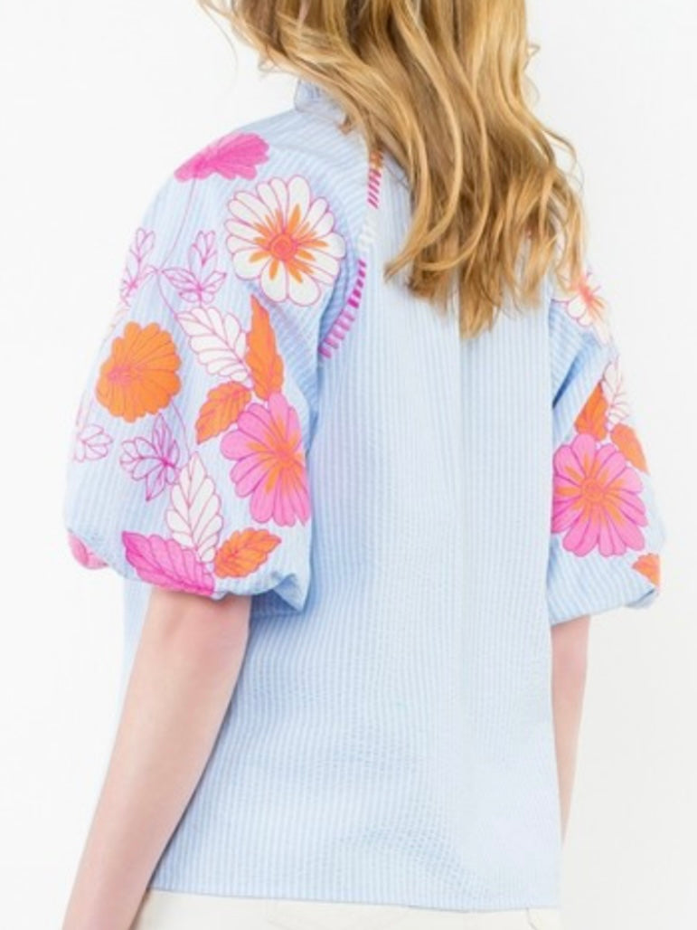 Light blue striped and pink embroidered floral texture top