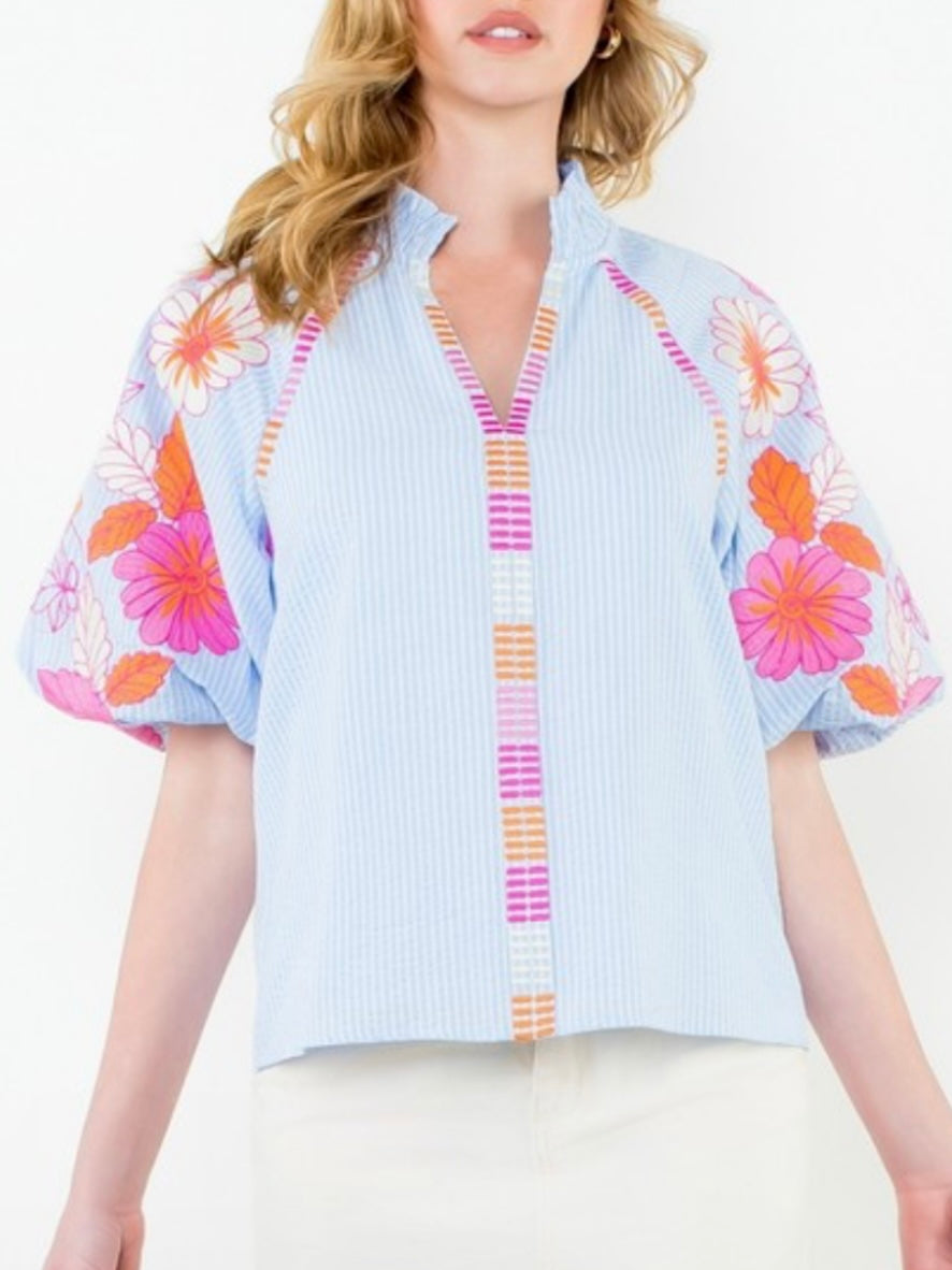 Light blue striped and pink embroidered floral texture top