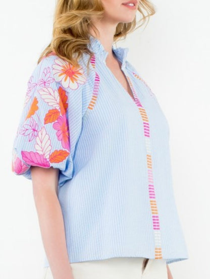 Light blue striped and pink embroidered floral texture top