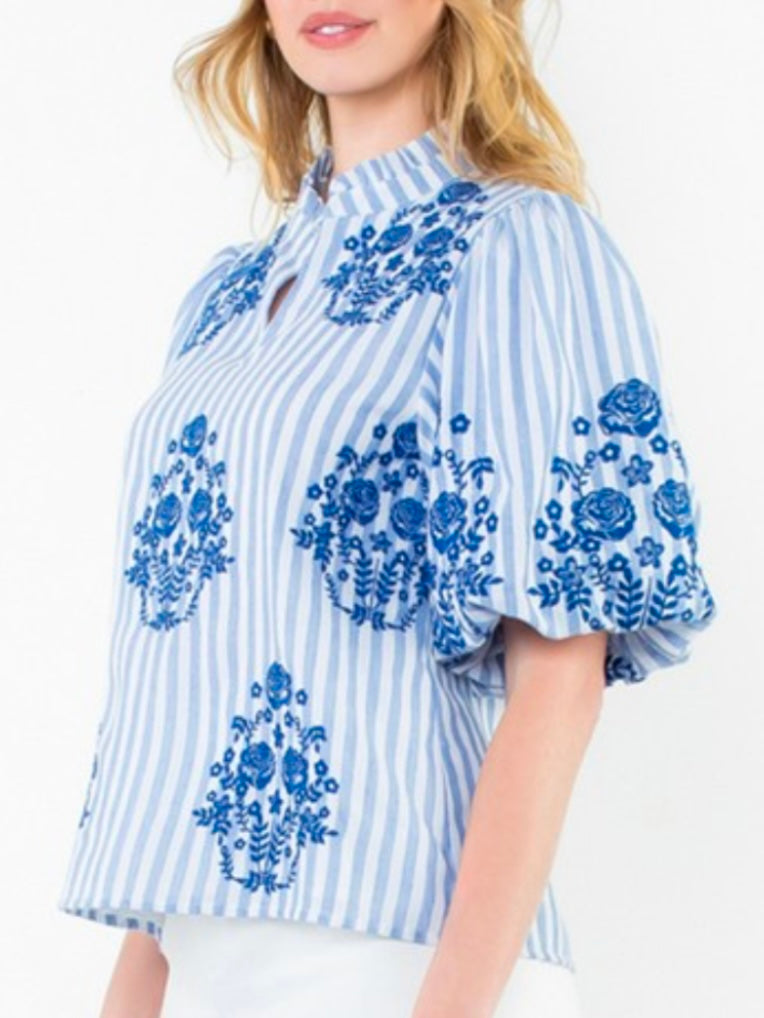 Light blue striped embroidered floral texture top