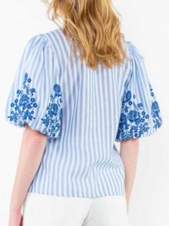 Light blue striped embroidered floral texture top