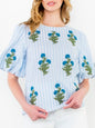 Light blue striped and green embroidered floral texture top