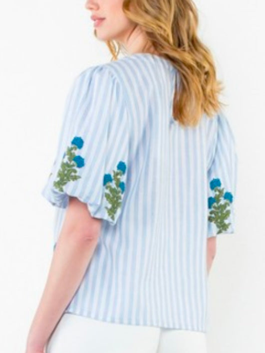 Light blue striped and green embroidered floral texture top