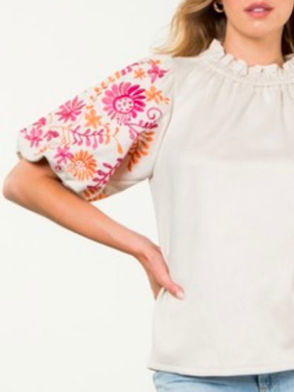 White and fuchsia embroidered floral texture top