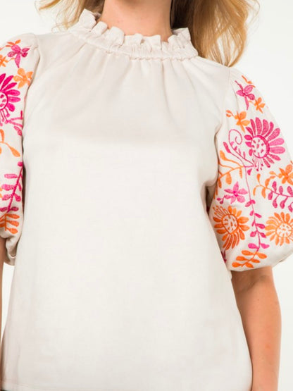 White and fuchsia embroidered floral texture top