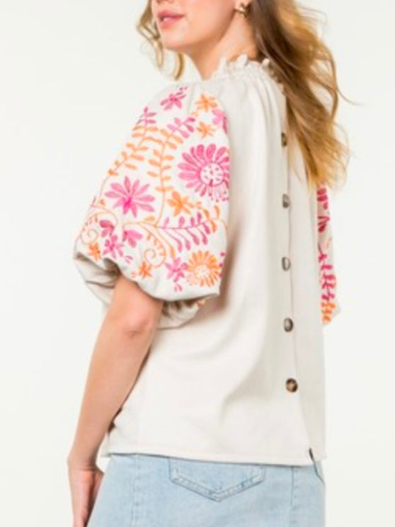 White and fuchsia embroidered floral texture top