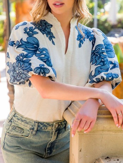 White and blue embroidered floral texture top