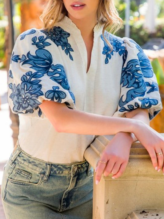 White and blue embroidered floral texture top