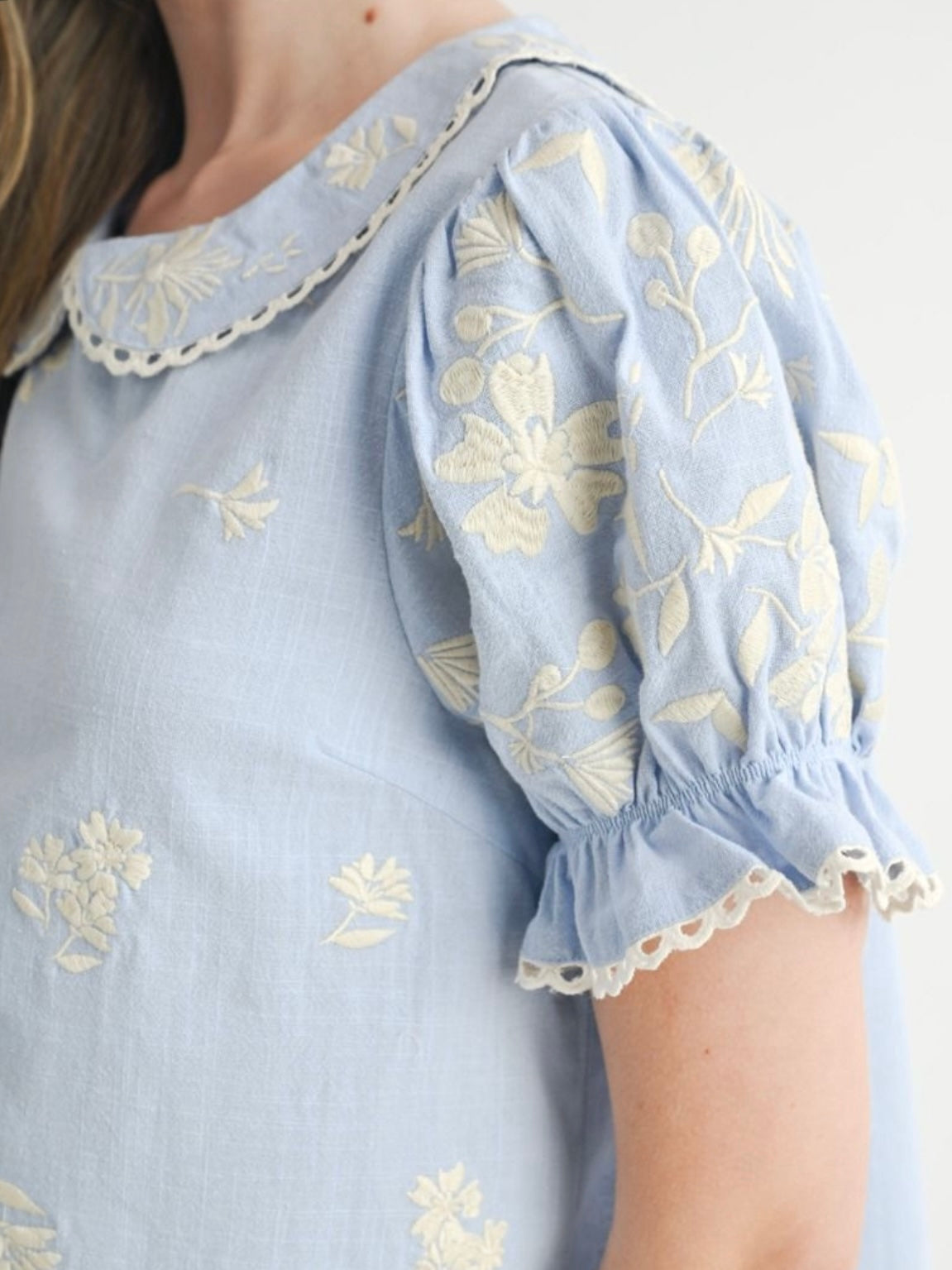 Light blue and beige embroidered floral top