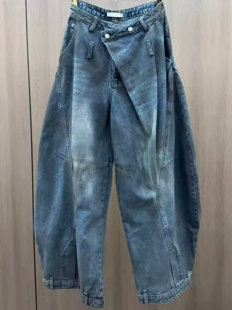 Blue jeans wide crossed destroyed details