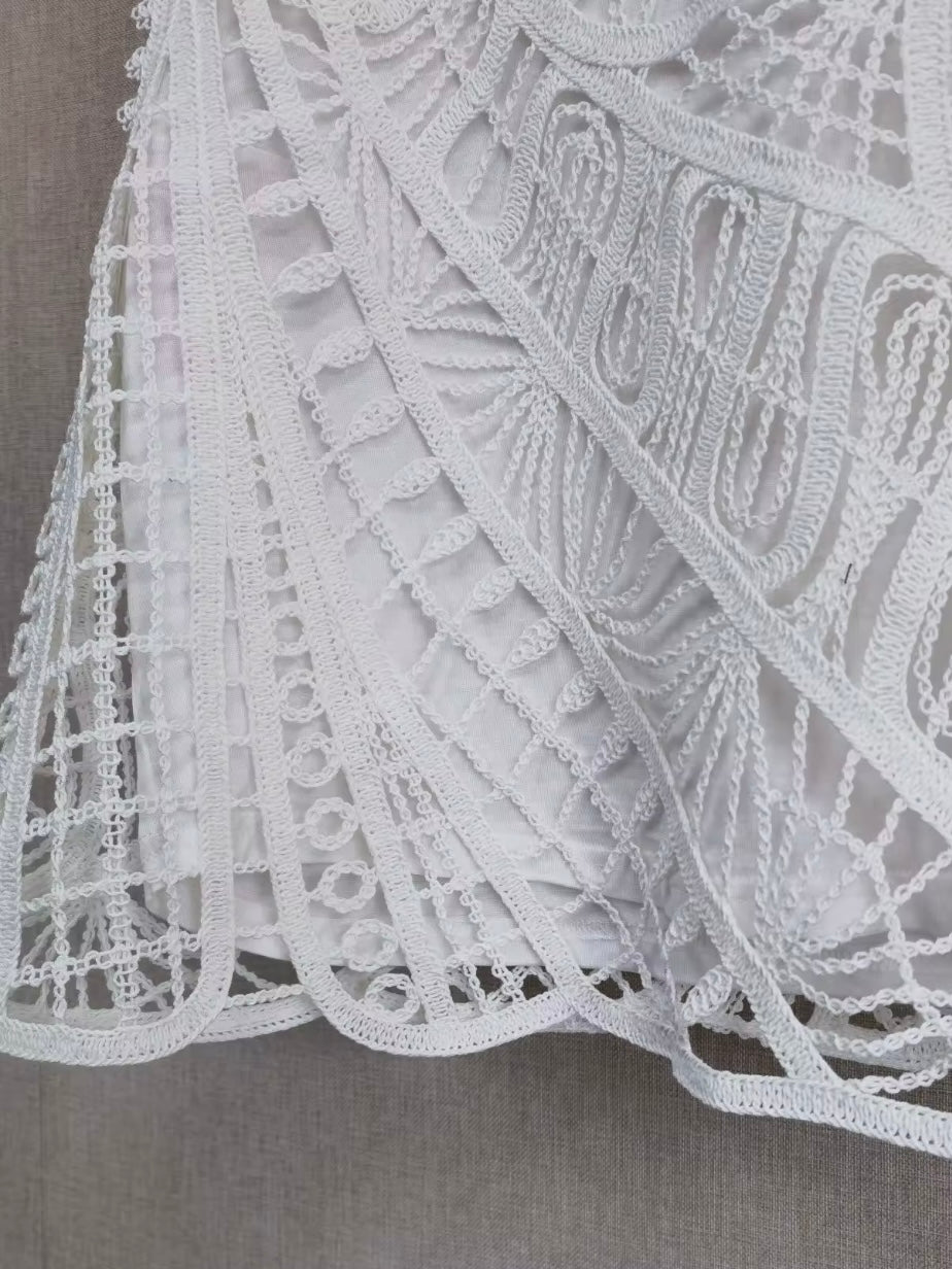 White sleeveless lace top