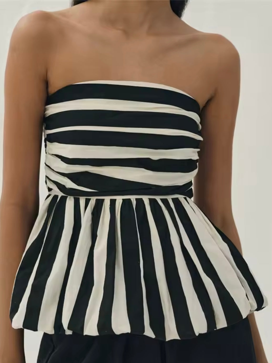 Black and white striped fabric strapless top