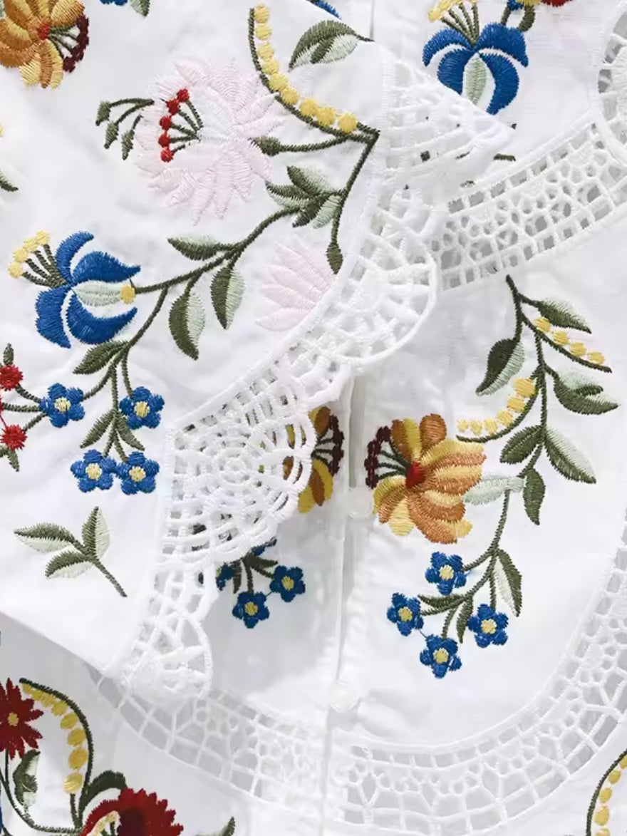 White and light blue embroidered floral shirt