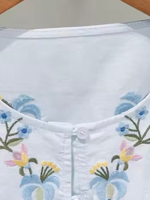White and light blue embroidered floral shirt