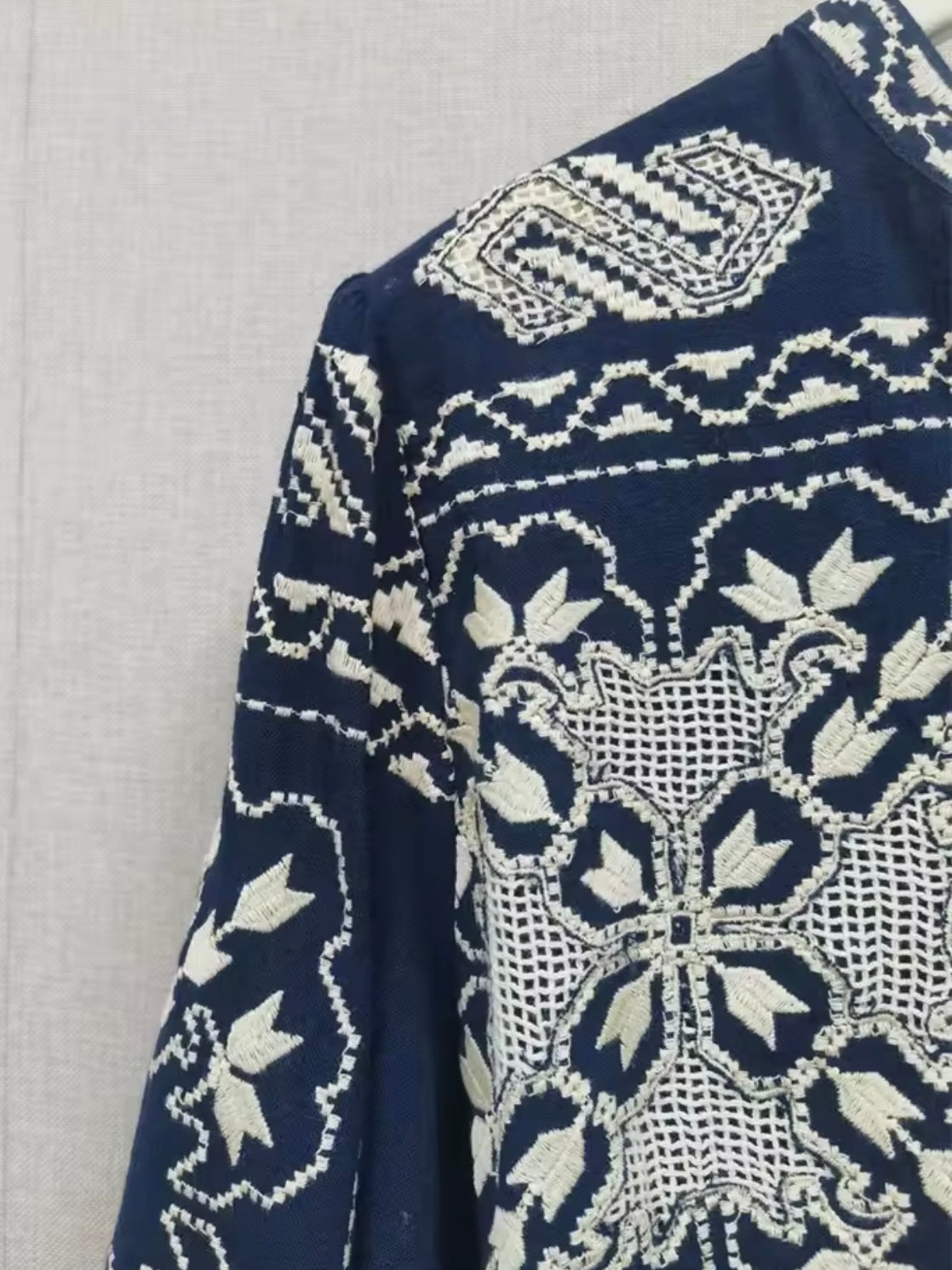 Navy blue and white embroidered shirt