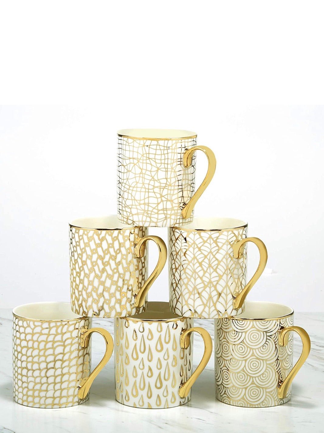 Geometric gold patterns mugs - Wapas