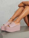 Pink high heels platform sandals