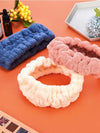 Pink, blue and beige padded facial headband