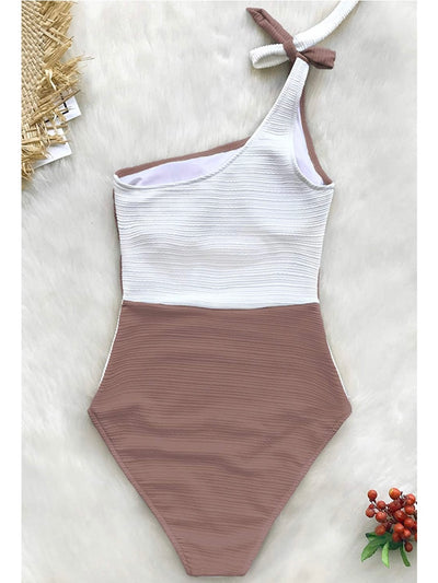 Light brown and white top / bottom one piece swimsuit
