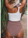 Light brown and white top / bottom one piece swimsuit