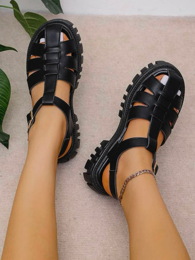 Black plastic sandals